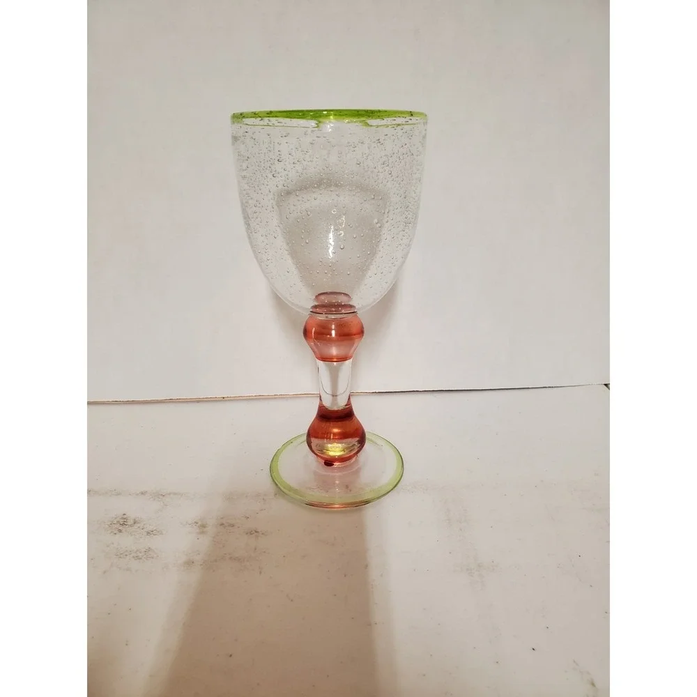 Pottery Barn wine glass featuring Bubble Effect Bowl And Pink Stem W/green Rim